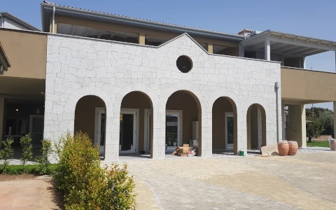 Rivestimenti edifici in granito P.I.L. Gran min